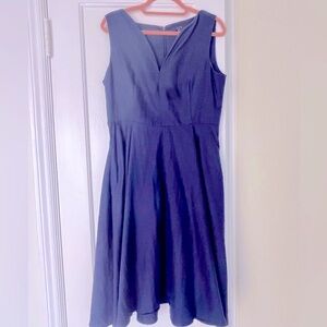 Navy blue dress with v-neck, mid/length circle skirt